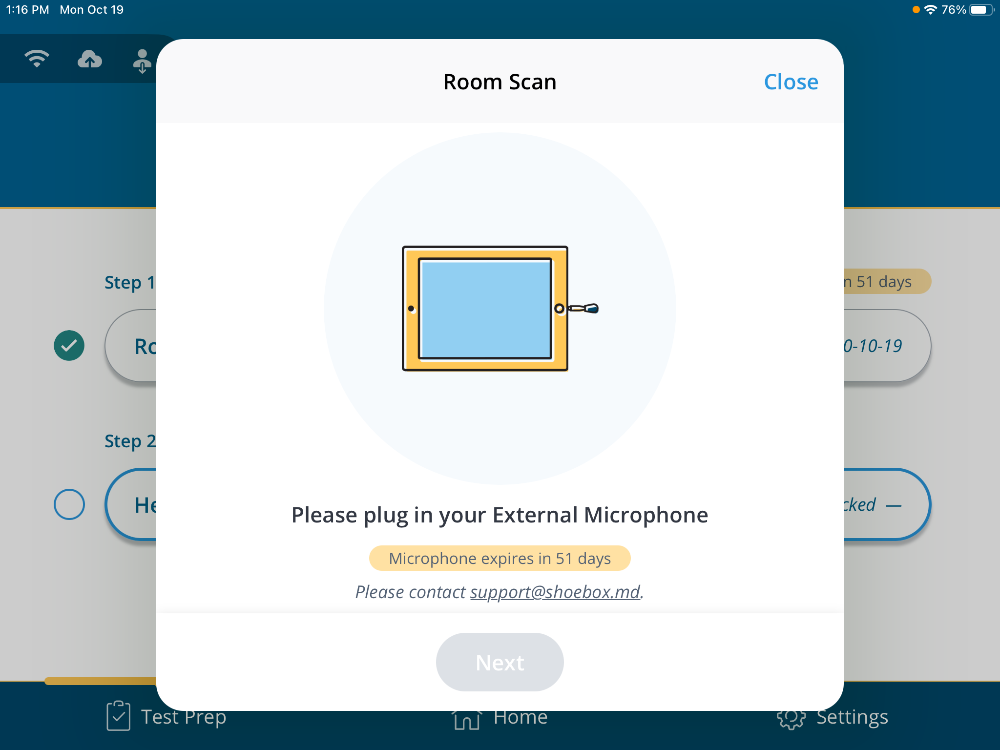 A screenshot of the prompt to plug in an external microphone after a room scan.