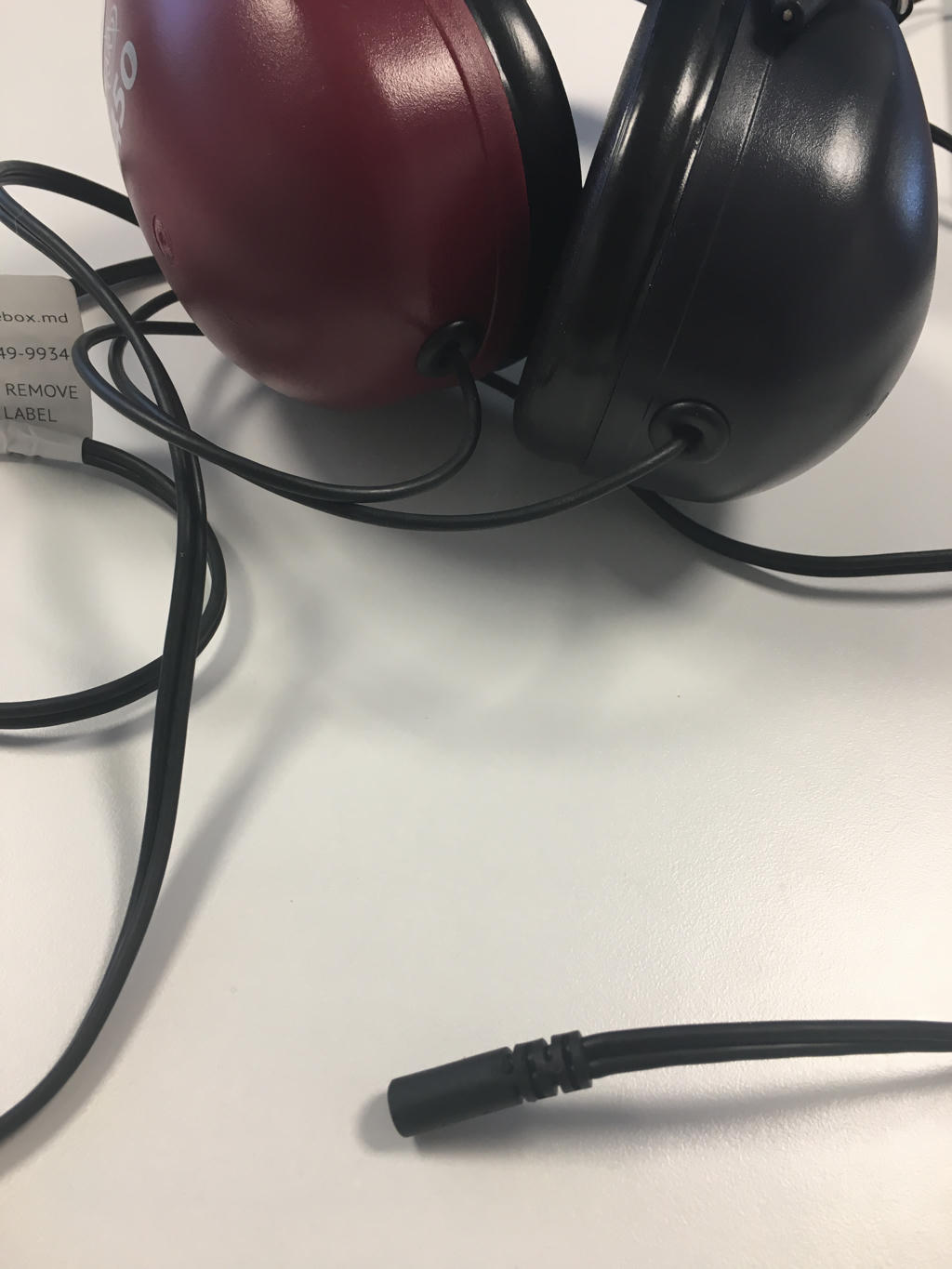 An image of DD450 headphones with a snapped off input jack.